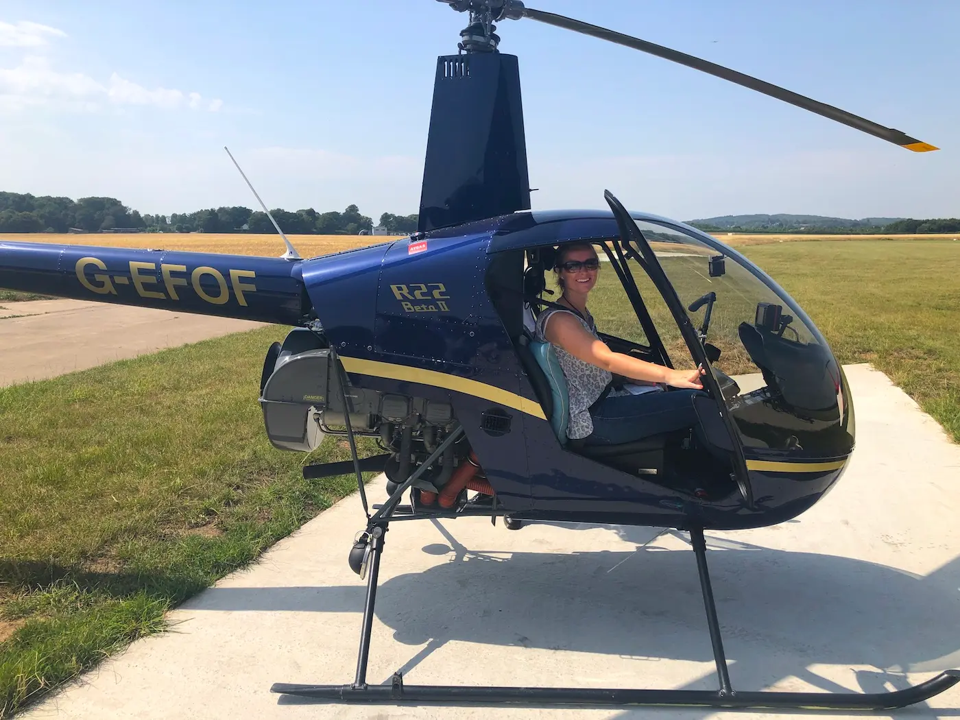 Student pilot in a Robinson R22 helicopter ready for a trial lesson