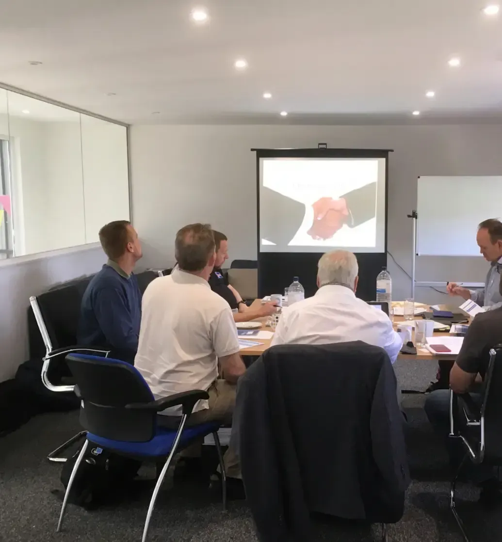 Helicopter instructors in a refresher seminar briefing